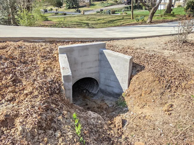 Custom residential drainage system designed around property slope and soil