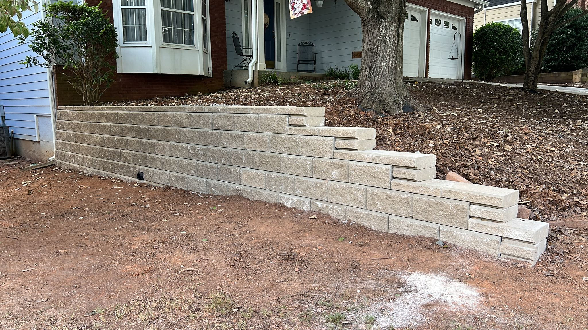 Multi-level backyard retaining wall and erosion control system